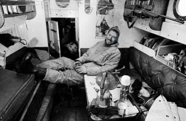 Circa 22nd April 1969: Robin Knox-Johnston relaxes to enjoy his first pint of beer in 313 days, after becoming the first man to sail solo non-stop around the globe. Knox-Johnston was the sole finisher in the Sunday Times Golden Globe solo round the world